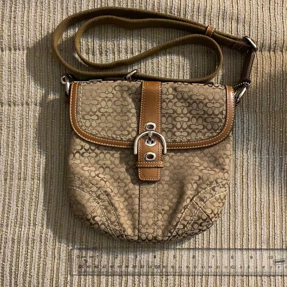 Coach Signature cross-body bag.